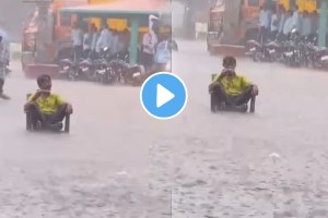 Heavy Rains Video Young Man Sits In The Flood Water And Drinks Tea Viral