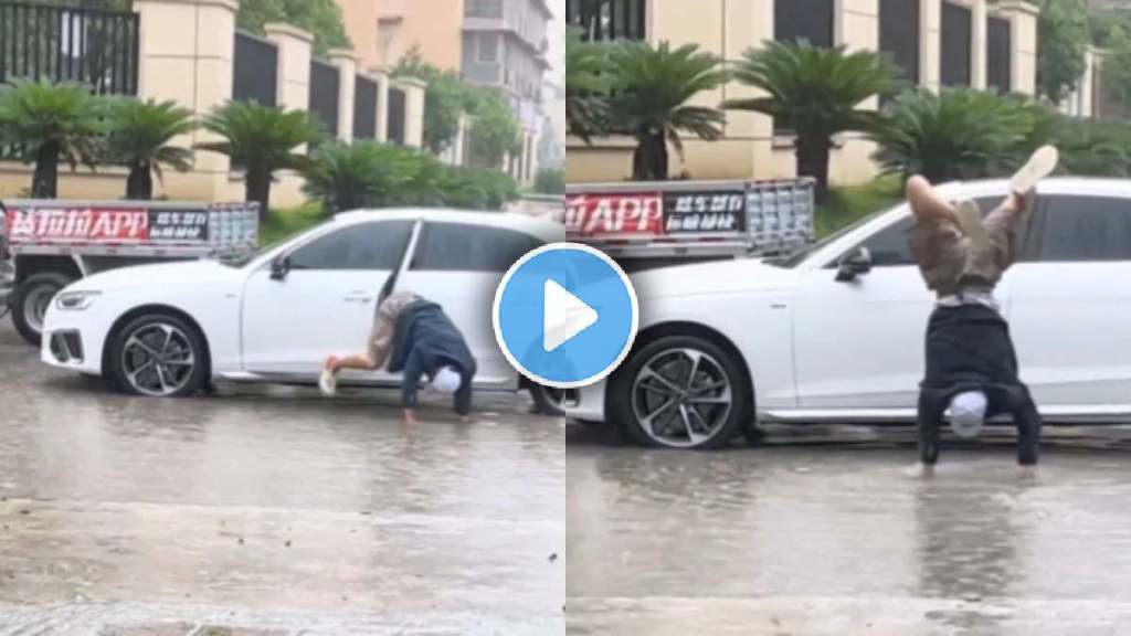 man walks on hand in rain water filled road for saving shoes funny video goes viral