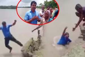 Reporter Falls in river while reporting assam flood