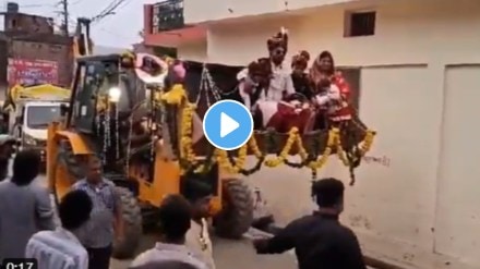 Man on his wedding procession on bulldozer wedding entry video