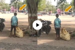 Garbage picker boy stands like a statue position as national anthem is heard watch viral video