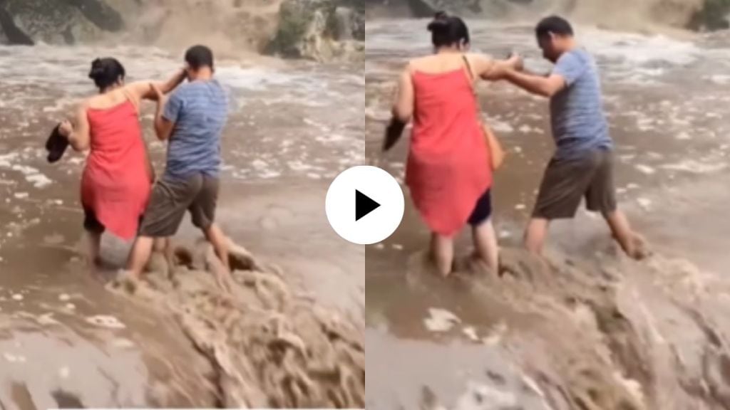 a woman was lucky was rescued by local people at waterfall shocking video goes viral