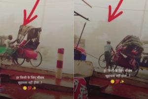 uncle saved his cycle rickshaw from flying in the stormy rain