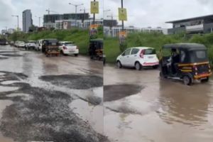 potholes filling with rainwater on the hinjewadi wakad service road