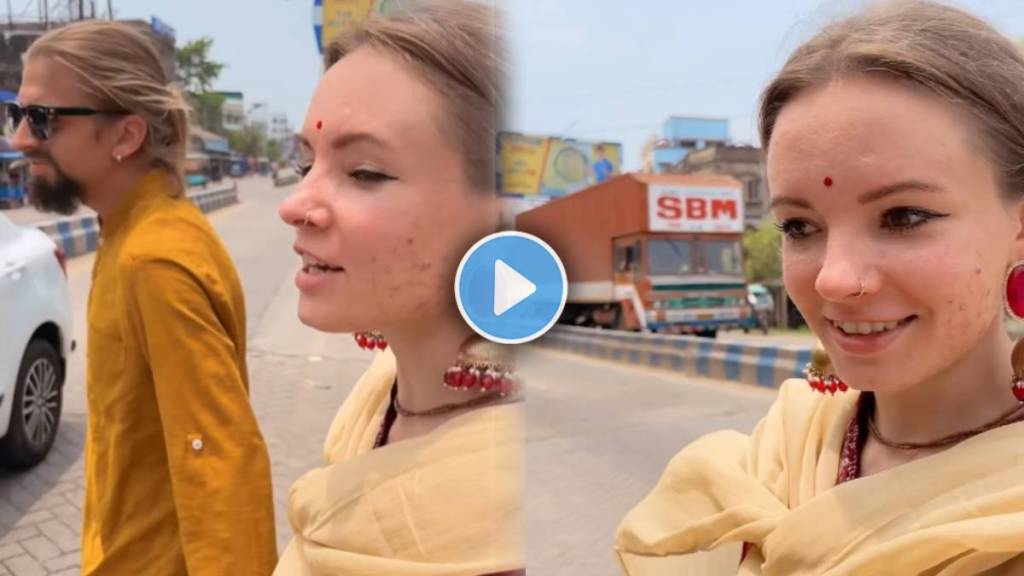 Video Show the foreign couples crossing the street in India