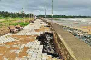High Tide Erodes foothpath over Sea Wall at Aksa Beach, Erodes foothpath over Newly Built Sea Wall, Environmentalists Urge Demolition of wall at aksa beach, High Tide Erodes foothpath over Newly Built Sea Wall , aksa beach, Tide Erodes Sea Wall