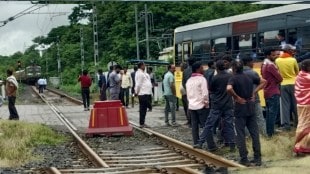 school bus stuck on rail track marathi news