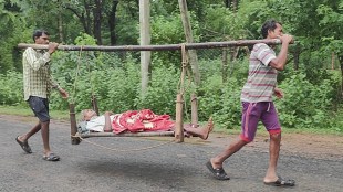 A cot handle to take the injured father to the hospital after falling while doing farm work  in gadchiroli