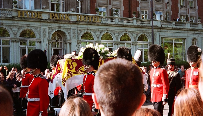 Diana's coffin, draped in the royal standard with ermine border, borne through London to Westminster Abbey