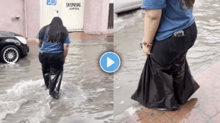 Viral Video of girl using garbage bags to prevent clothes from rain water jugaad viral on social media