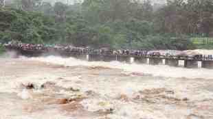 Pune, Khadakwasla Dam, Mutha River, flood alert, 35000 cusecs, heavy rainfall, Water Resources Department, riverbanks, Baba Bhide bridge, Municipal Corporation, safety precautions, pune news