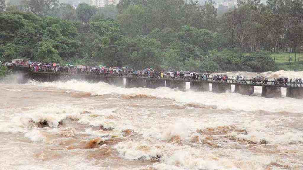 Pune, Khadakwasla Dam, Mutha River, flood alert, 35000 cusecs, heavy rainfall, Water Resources Department, riverbanks, Baba Bhide bridge, Municipal Corporation, safety precautions, pune news