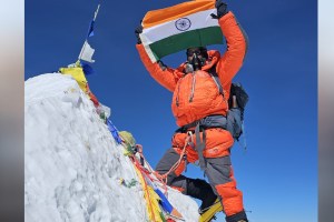 Flag of Maharashtra Police Force with Indian tricolor on Mount Makalu