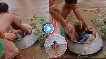 viral video sick old woman pass flooded area in cooking pot