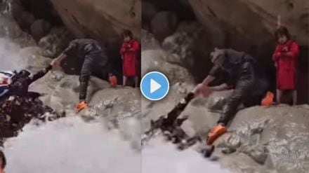 Woman Being Swept Away by Waterfall