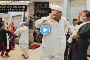 Grandfather and granddaughter dancing