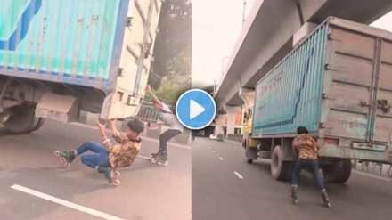 Young boy skating under a moving truck