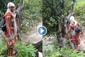 anganwadi worker cross the flooded river video goes viral