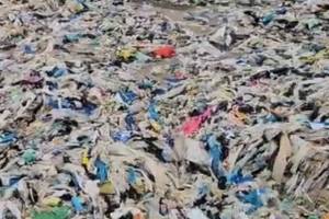 garbage piled lying on silver beach since the month at madh island