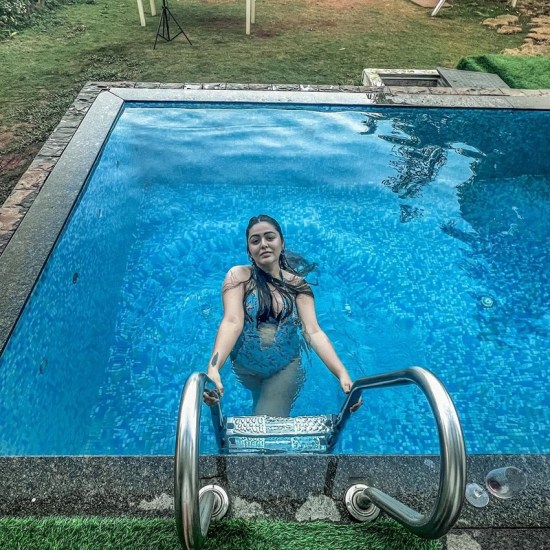 Shafaq Naaz Poses in Blue Bikini Fans give Shocking Reaction