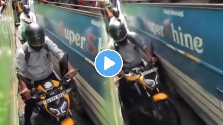 Shocking video bike rider got stuck between the-two buses video