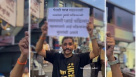 Boy hold poster of parents love in front of road photo goes viral on social media