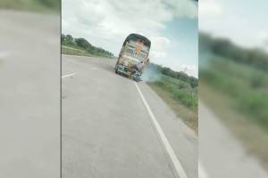 truck hit bullet rider grabbed the bonnet of truck