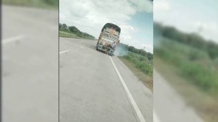 truck hit bullet rider grabbed the bonnet of truck