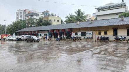 Passengers struggled in heavy rain bus stand closed for a memorial ceremony