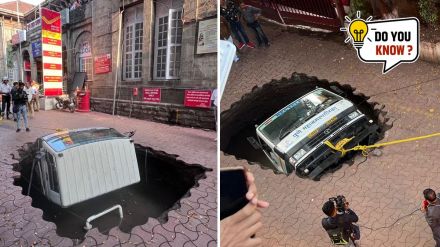 PMC Truck falls into sinkhole developed