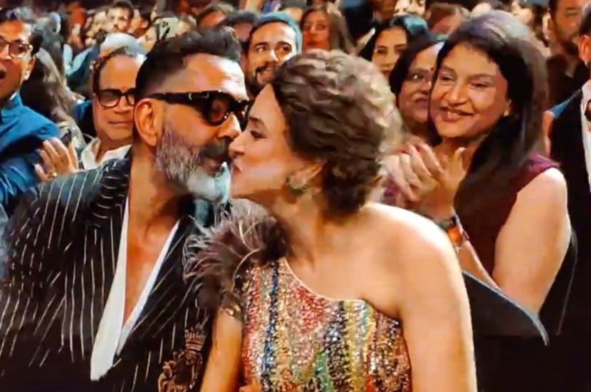 bobby deol kisses his wifr before receiving iifa award 2024