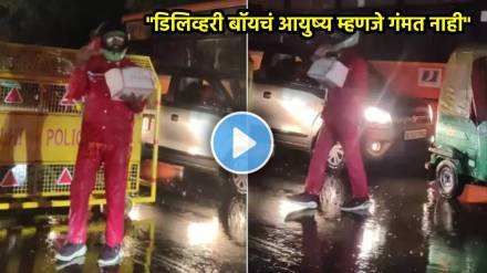 Zomato delivery boy searches for customer during traffic