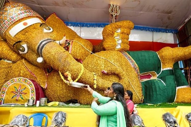 Ganesh Chaturthi celebrations 2024, Ganpati Bappa Morya chants, Ganesh idols installation, Ganesh Utsav in India, Famous Ganpati pandals in Mumbai