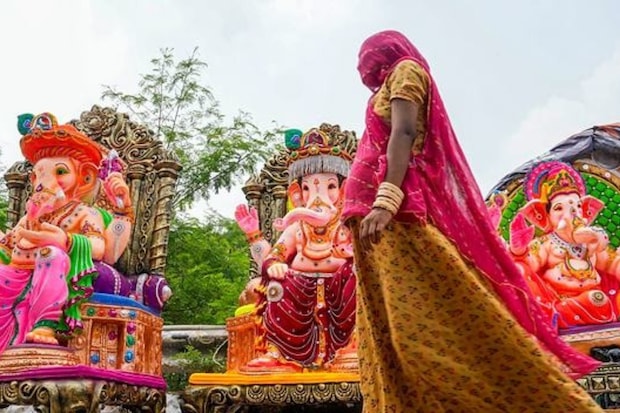 Ganesh Chaturthi celebrations 2024, Ganpati Bappa Morya chants, Ganesh idols installation, Ganesh Utsav in India, Famous Ganpati pandals in Mumbai