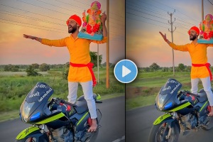 ganesh chaturthi young man bike stunt with ganesha idol