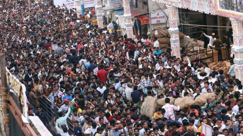 During Ganeshotsav, people thronged at Shivaji road near Dagdusheth in large numbers as it was the last Sunday to witness the spectacle.Express Photo By Pavan Khengre,15.09.24,Pune.