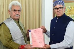 Jammu and Kashmir National Conference Vice President Omar Abdullah with LG Manoj Sinha in Srinagar.