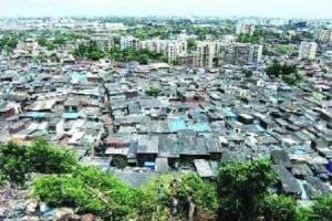 state government aims to complete stalled slum redevelopment schemes and plans to fine developers