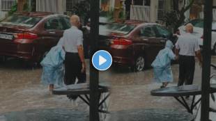 Viral Video Shows A grandfather holding his grandson hand