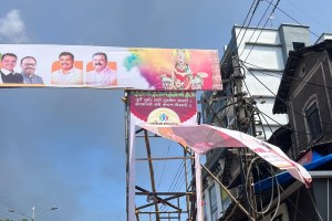 unidentified person tearing of political parties navratri banners