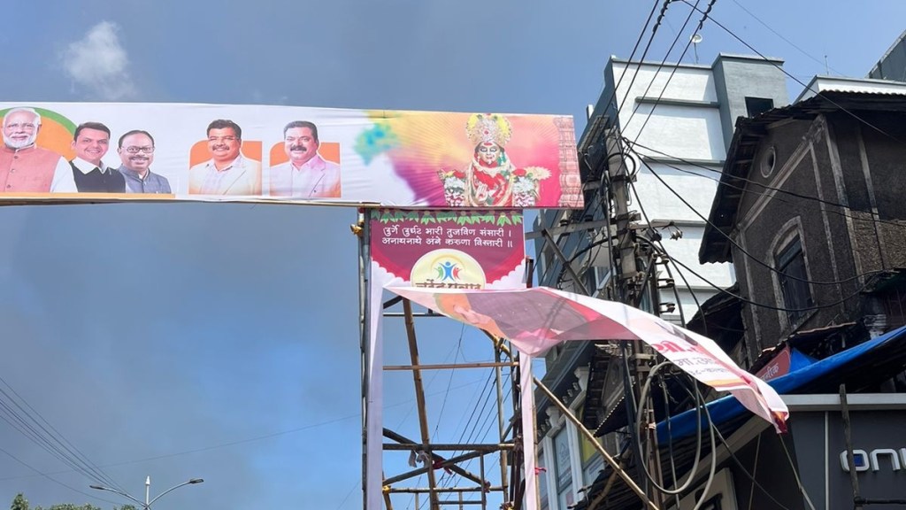 unidentified person tearing of political parties navratri banners