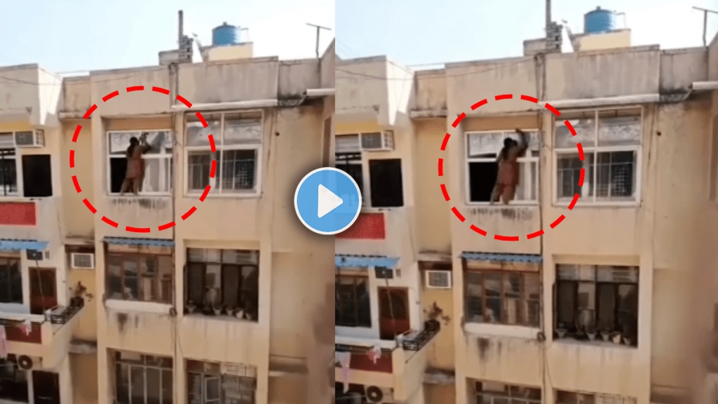 Viral video of woman cleaning window diwali safai from top floor of building