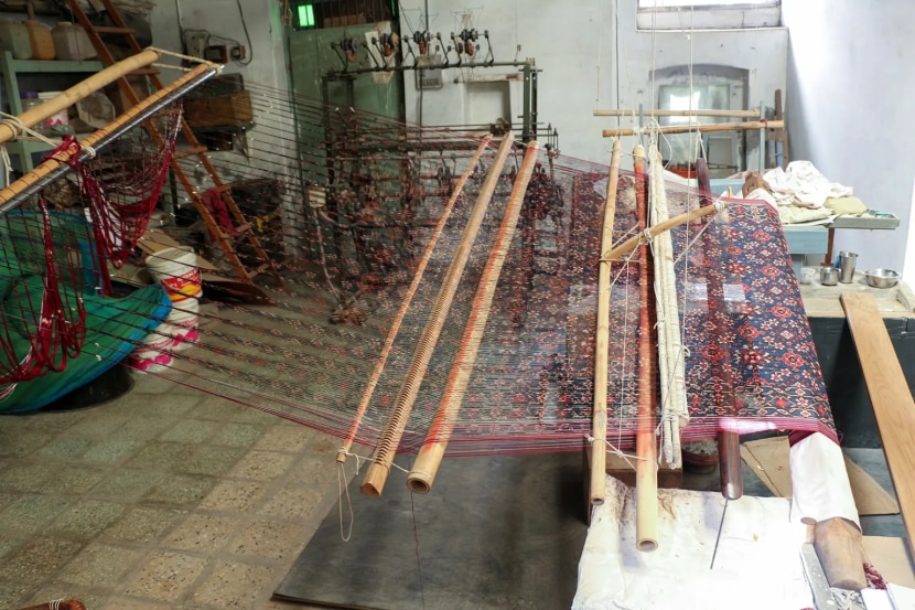 A Gujarati patola ikat sari being woven in a loom (Source: Wikimedia Commons)