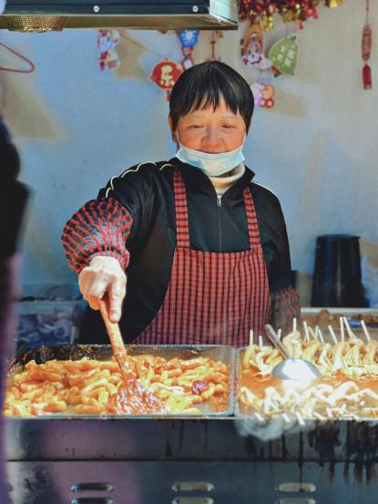 How much meat do people eat every year in China?