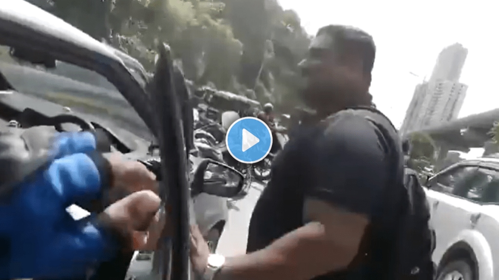 Car driver and bike rider dispute on Mumbai road viral video on social media