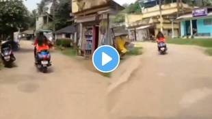 Girl racing up on scooty with a bike fall down badly on scooty shocking funny video goes viral