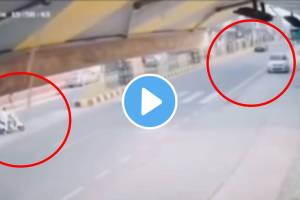 Man hit a car while seeing in mobile on road shocking accident video viral