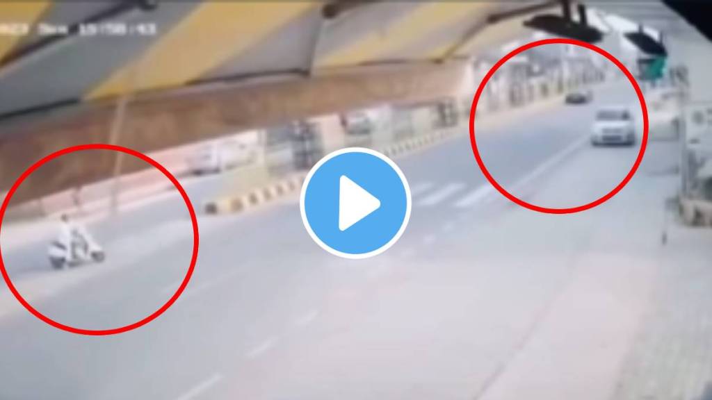 Man hit a car while seeing in mobile on road shocking accident video viral