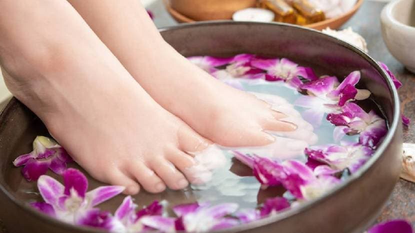 Use a large basin or foot bath to comfortably accommodate both feet