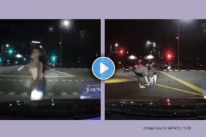 Viral video shows car hitting woman distracted by phone the Internet is stunned by what she does next